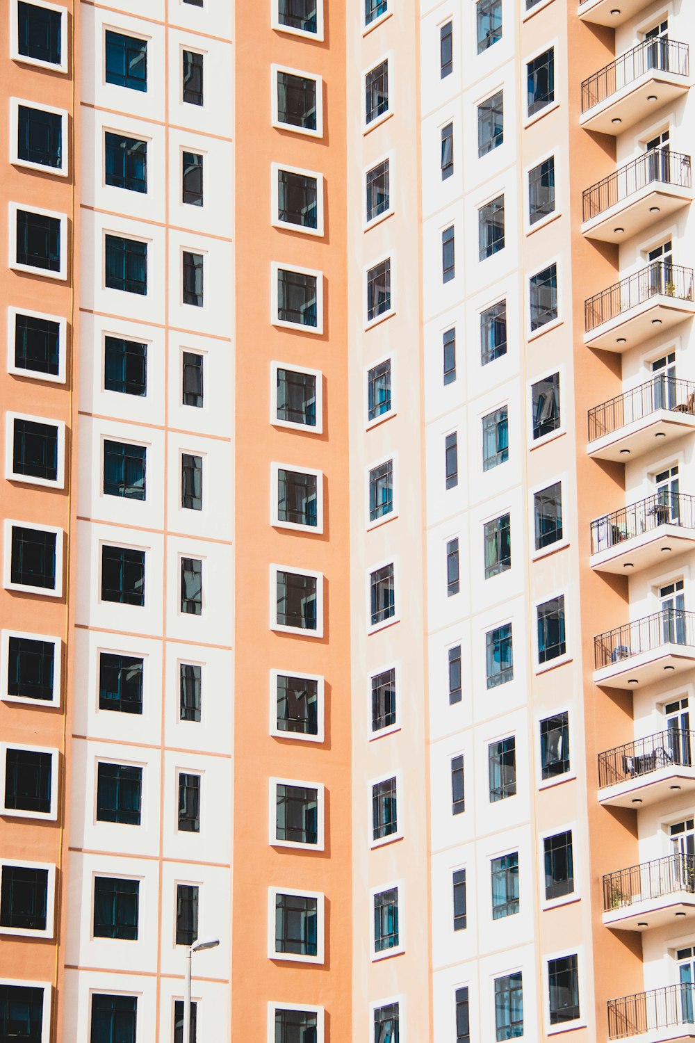 white and yellow concrete building during daytime