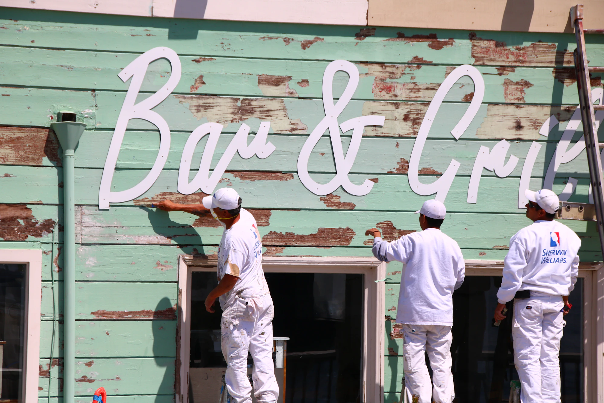 Painters working together