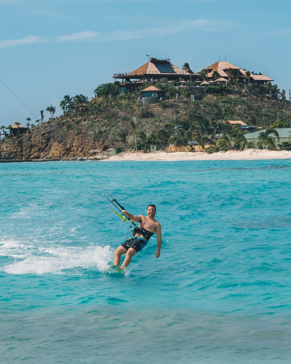 man playing windsurfing board