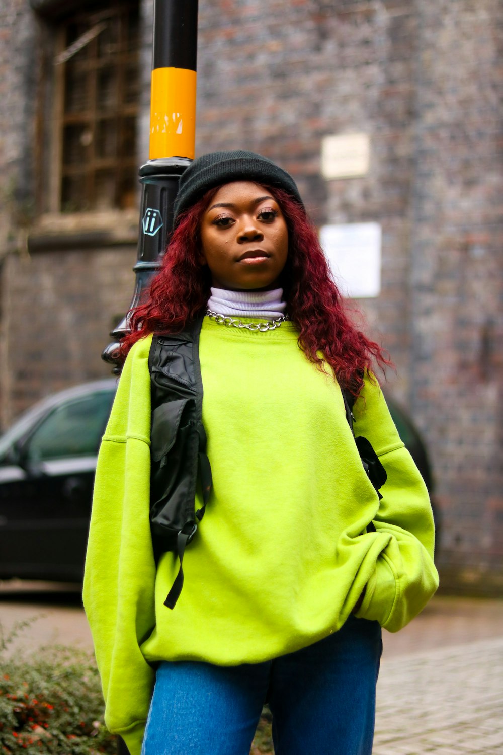 woman wearing green sweater