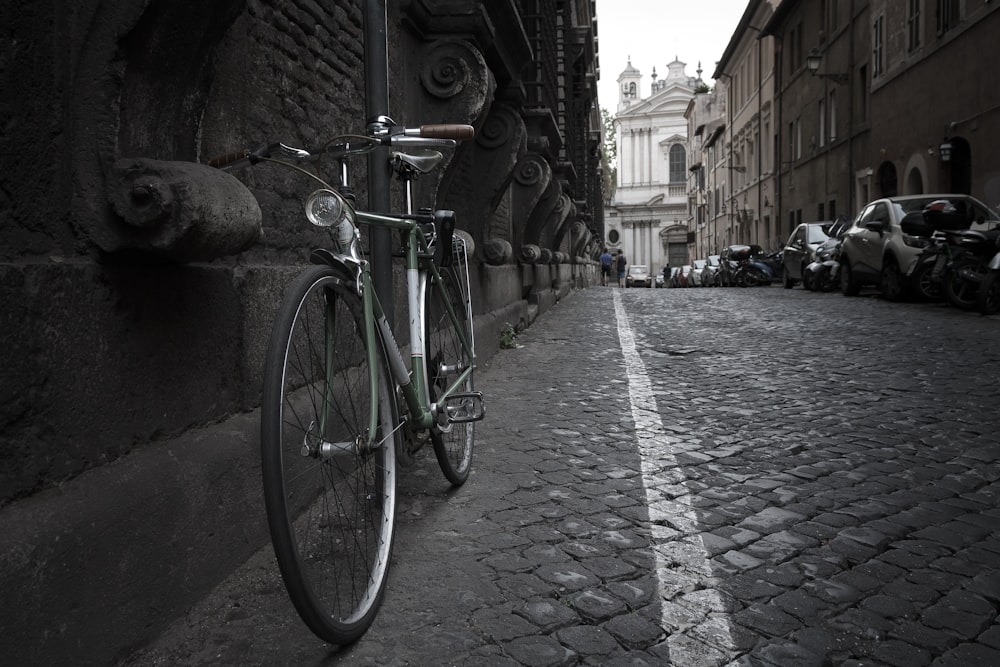 black bicycle near wall