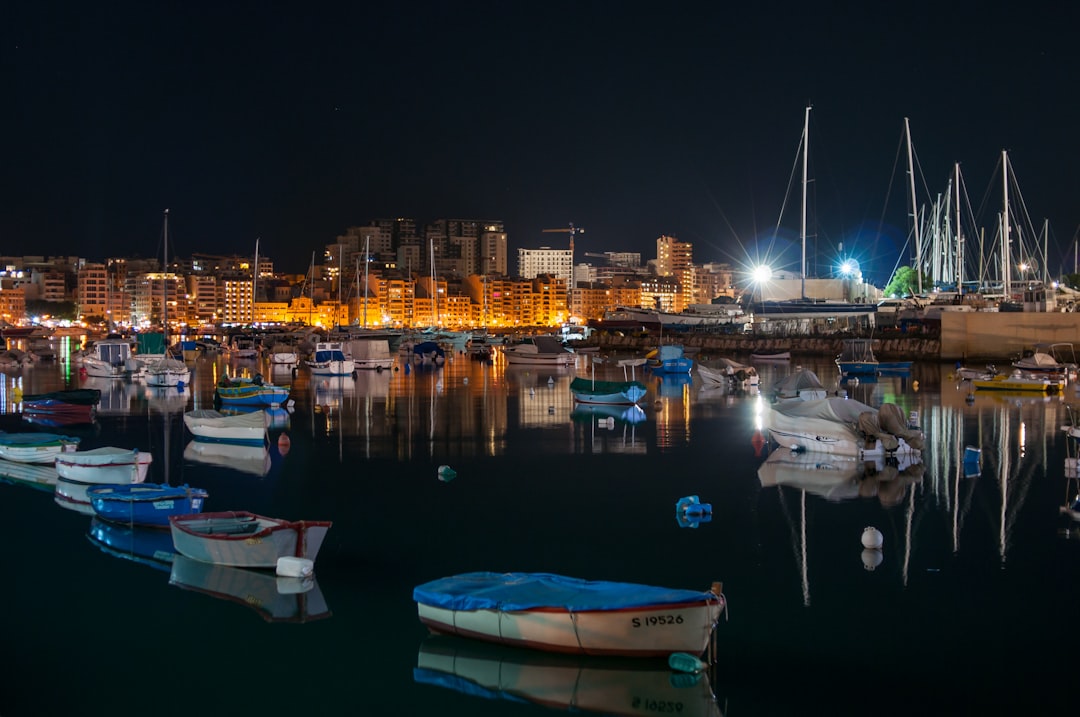 white sail boats, in Malta