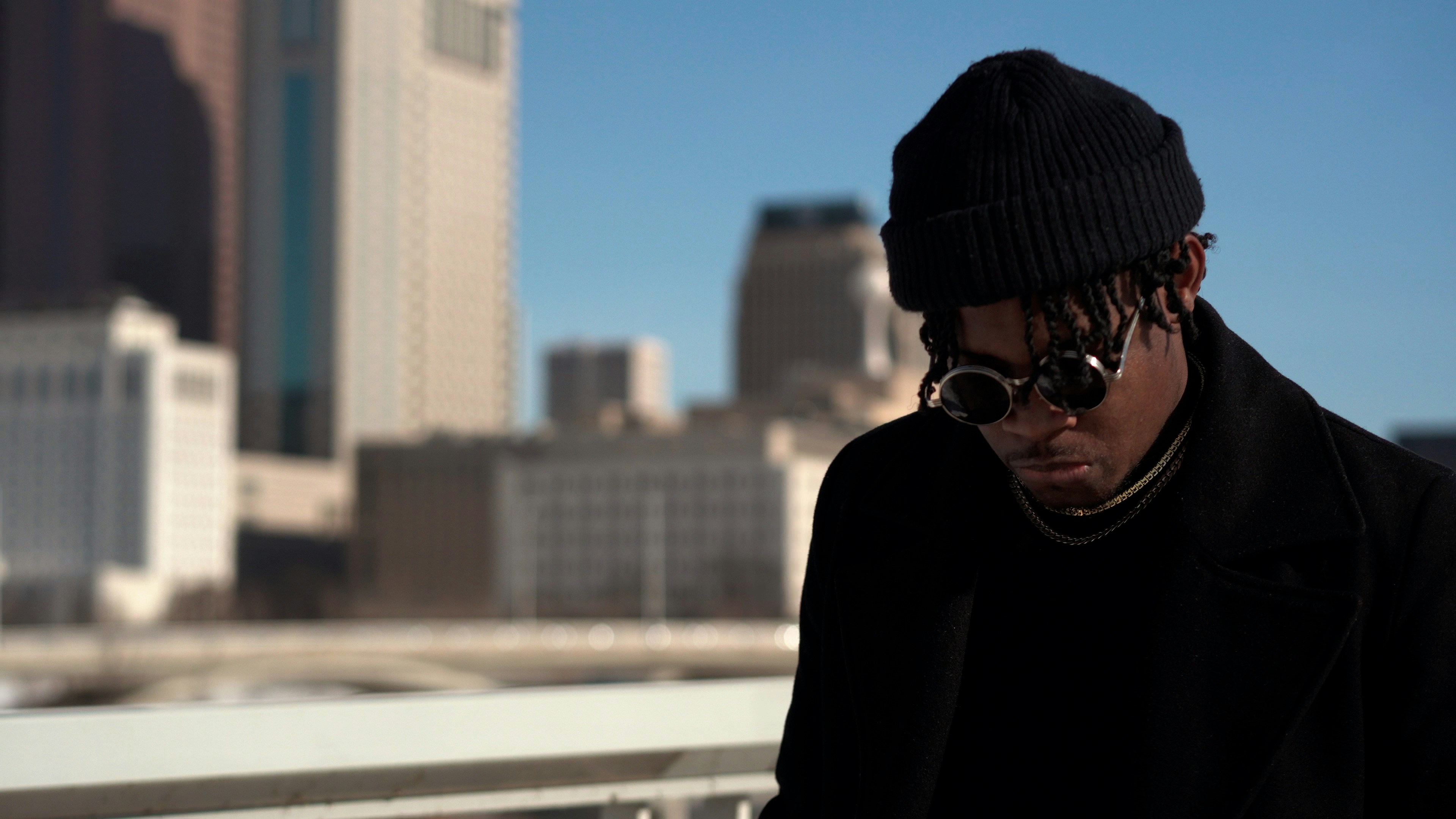 man wearing black coat