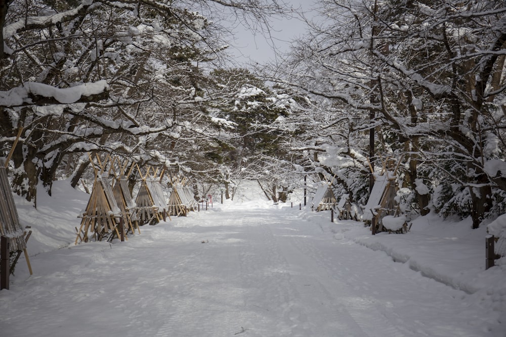 brown wooden house with snow