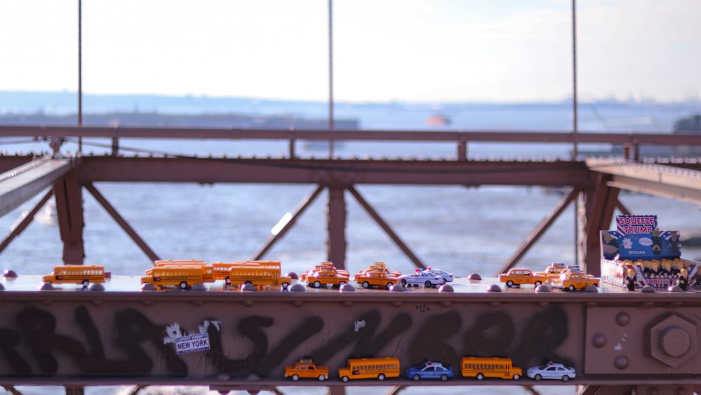 different car toys on railings