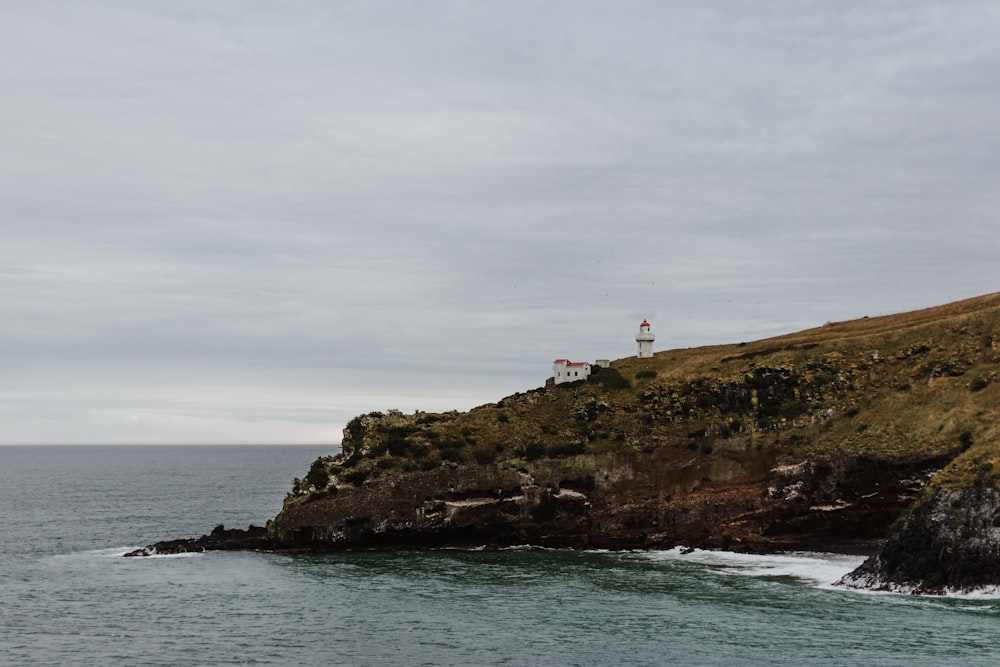 white house near the cliff