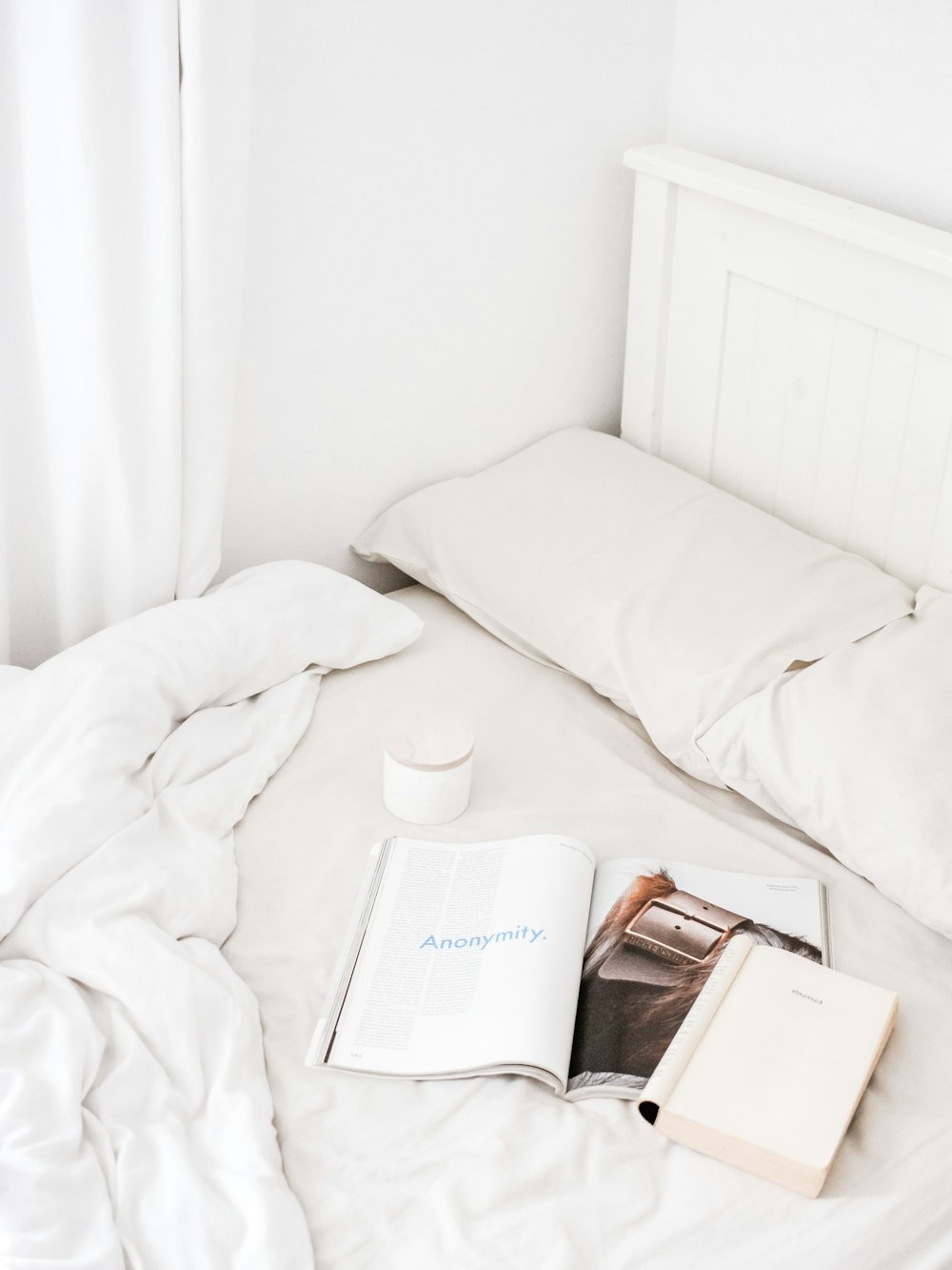 white book on bed