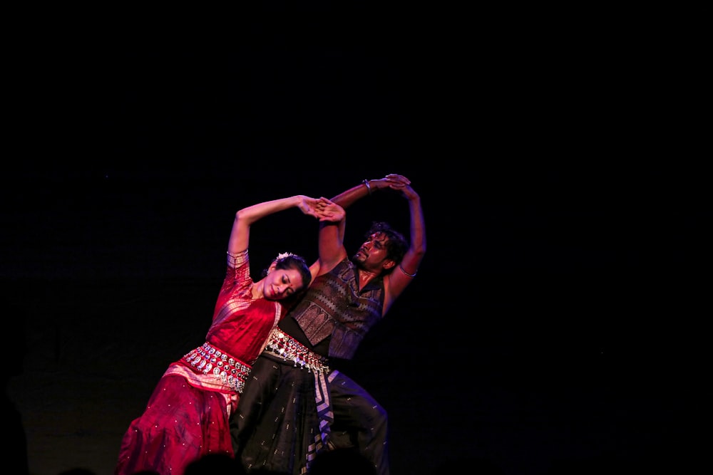 man and woman dancing together