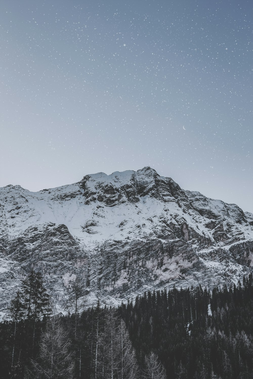 mountain covered with snow during daytime