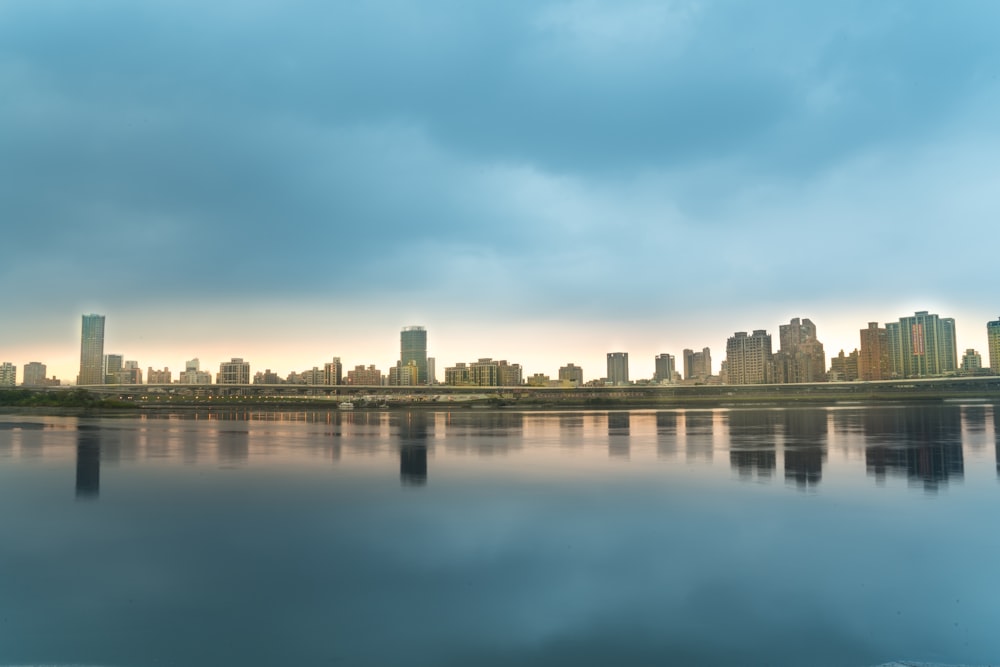 panoramic view of city during daytime by sea