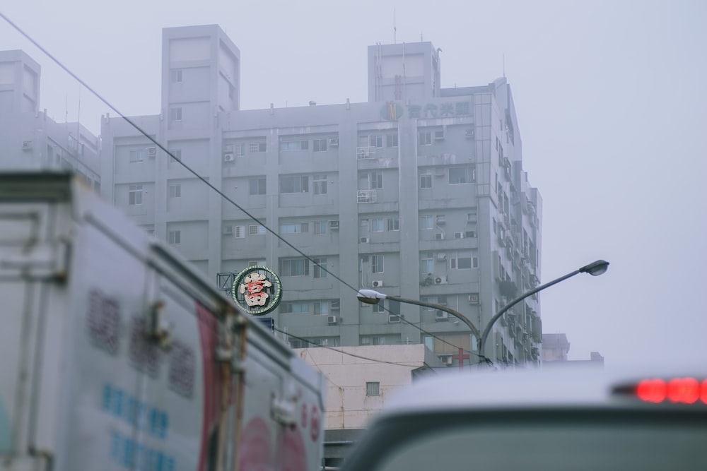 vehicle near the building during daytime