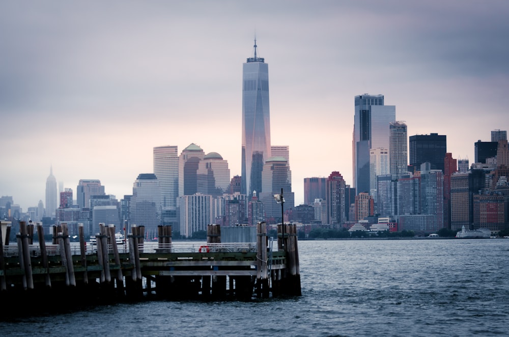 city buildings beside sea during daytime