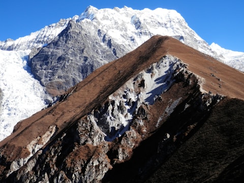 mountain covered by snow