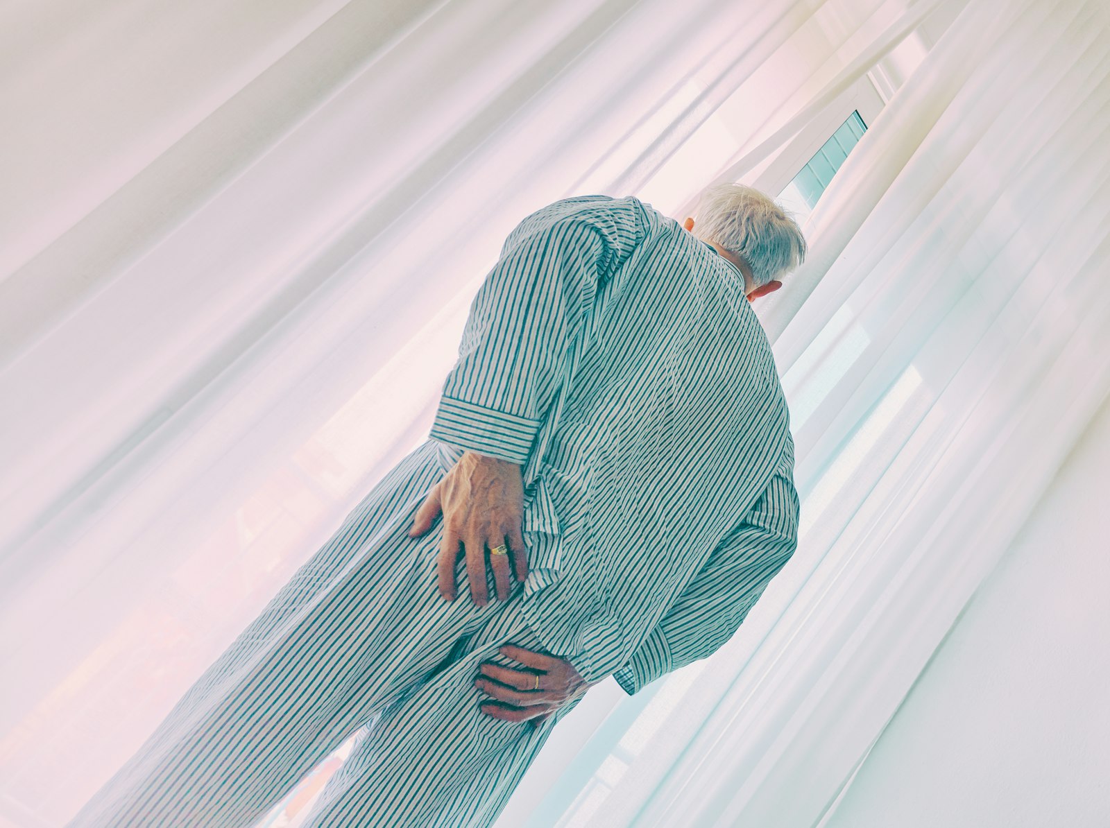 Older adult with back discomfort