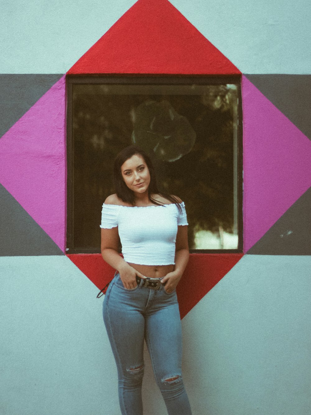 woman leaning against wall