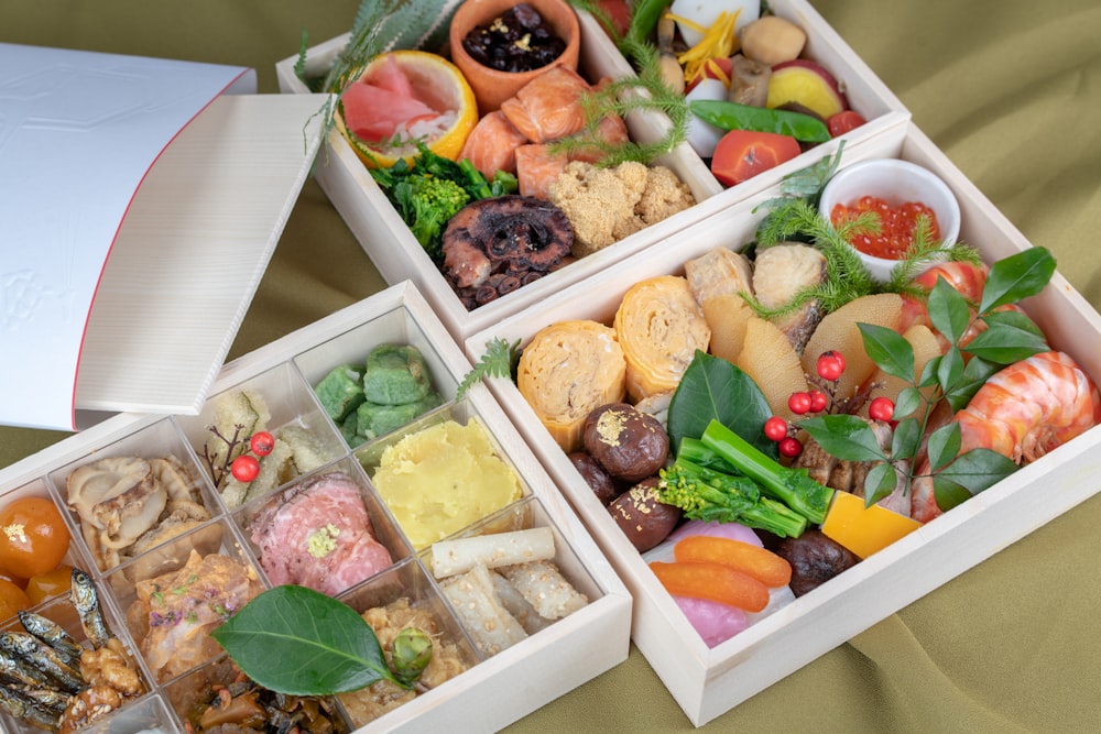 chocolates and fruits on three boxes