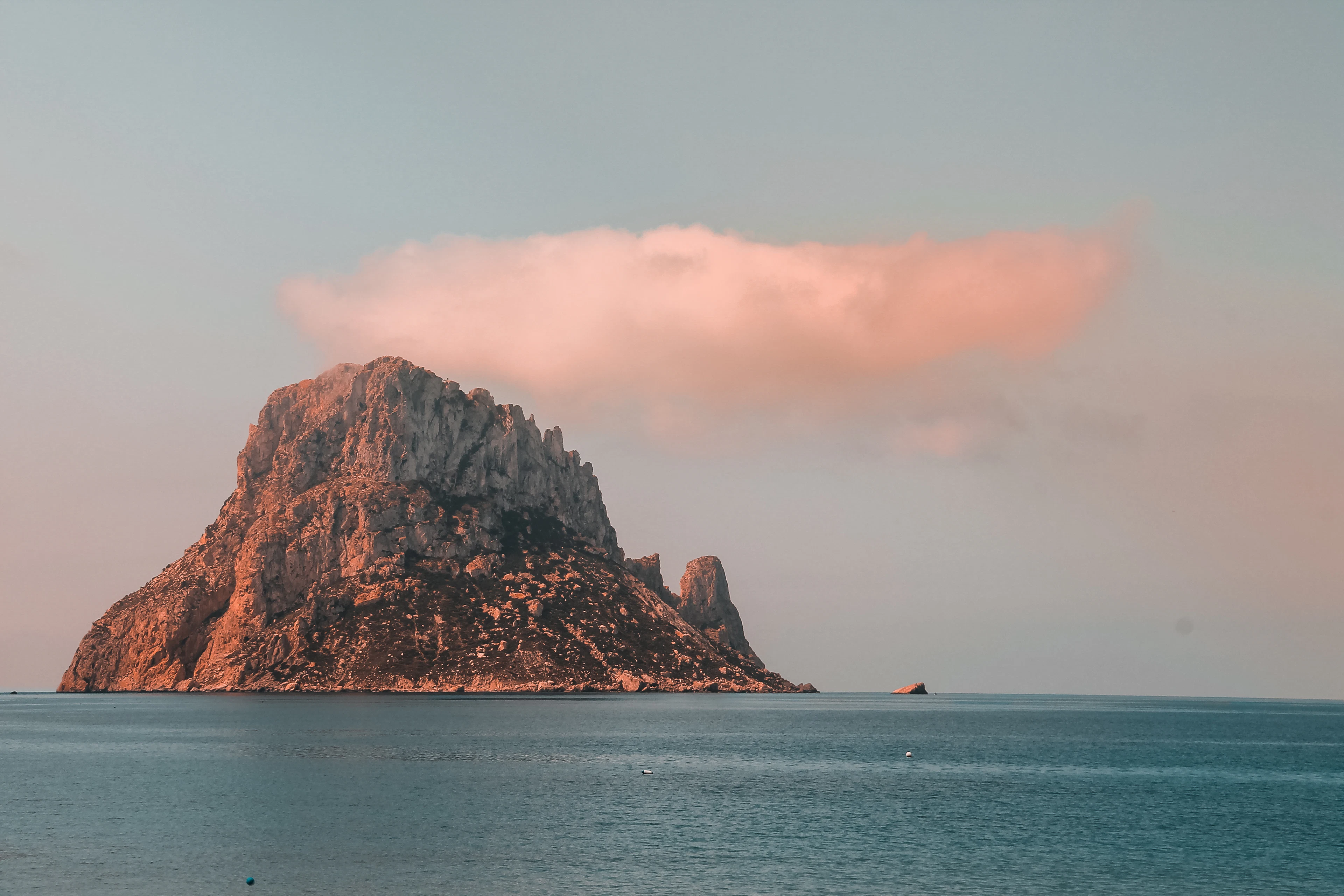 The rocky islet of Es Vedrà rising from the sea off the west coast of Ibiza