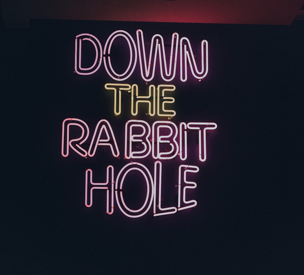 down the rabbit hole sign