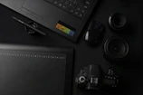 Creative flat lay of marketing materials including flyers, business cards, and digital mockups.