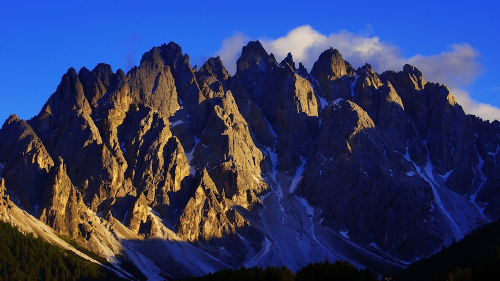 brown mountains under blue sky