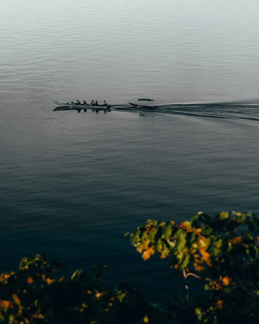 people on boat during golden hour