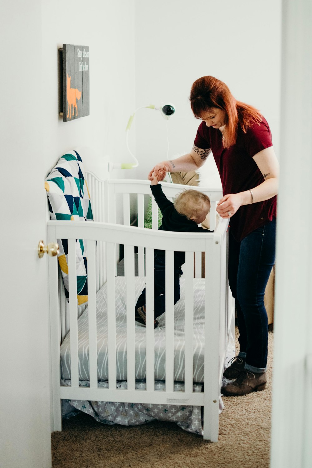 baby's inside wooden crib