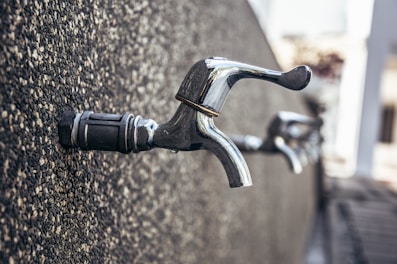 Close-up of elegant bathroom faucets and fixtures.