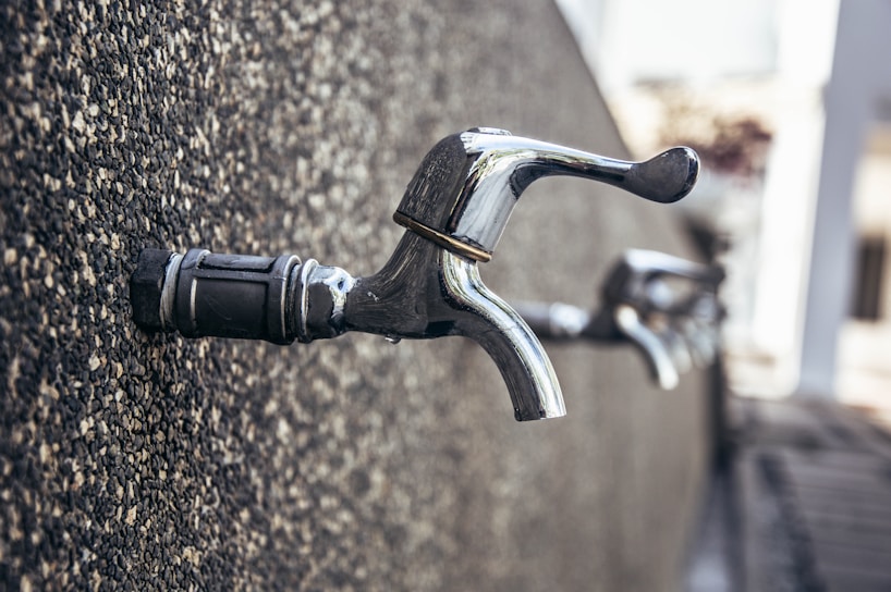 Close-up of a high-quality water tap manufactured by Ridhi Sidhi Industries, gleaming under soft lighting.