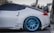 A sleek car adorned with eye-catching vinyl decals on its rear window.