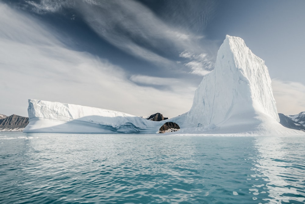 iceberg under white sky