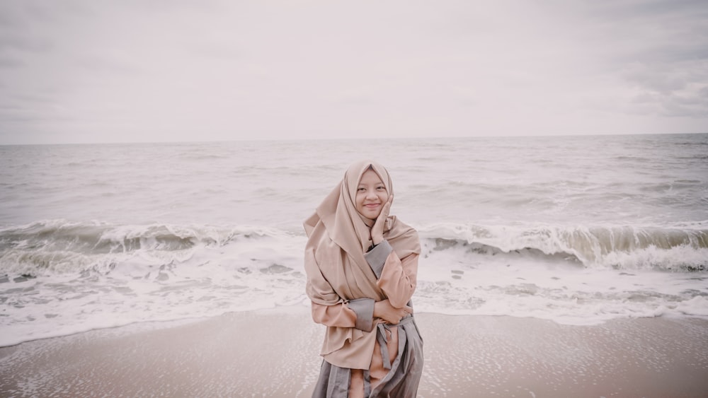 woman standing near ocean