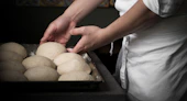 person baked bread