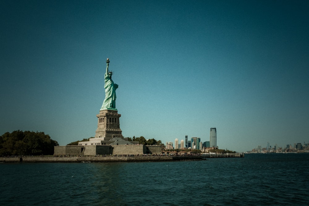 Liberty Statue during clear blue sky