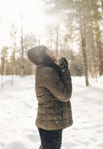 woman standing on snow field