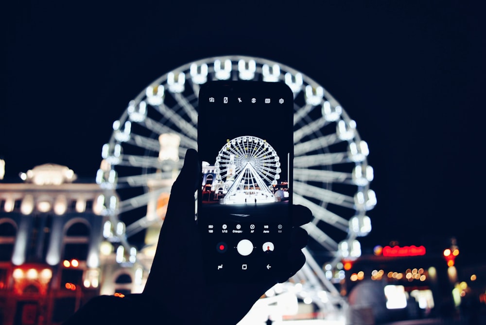 lighted ferris wheel at night