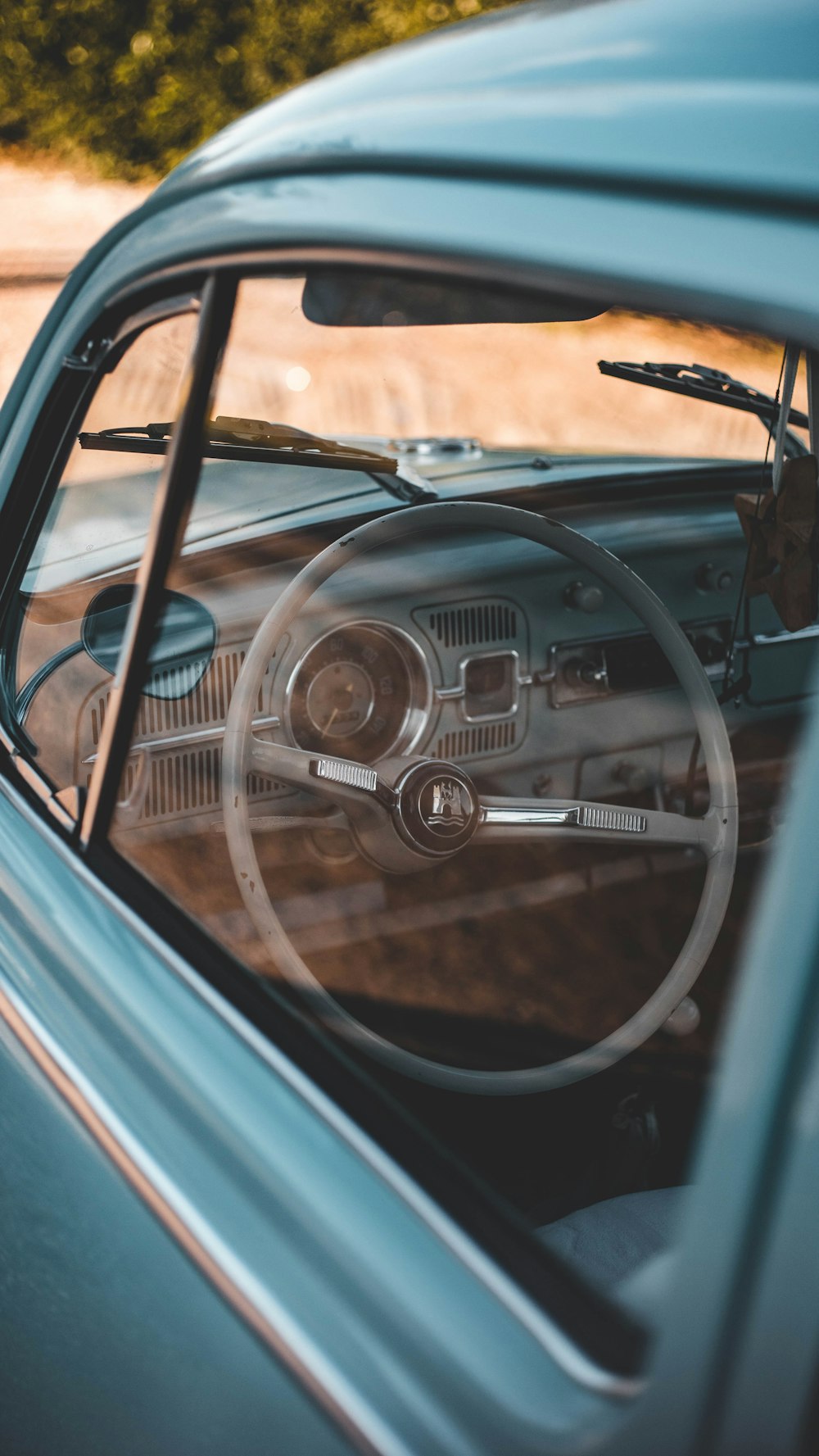 shallow focus photo of black steering wheel