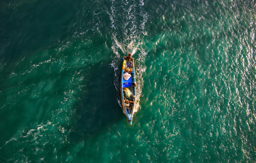 A dynamic collage of popular boating and fishing influencers using promoted gear in action-packed shots