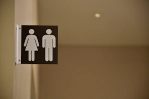 male and female comfort room sign