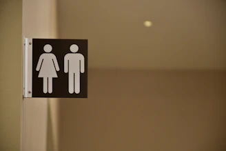 male and female comfort room sign