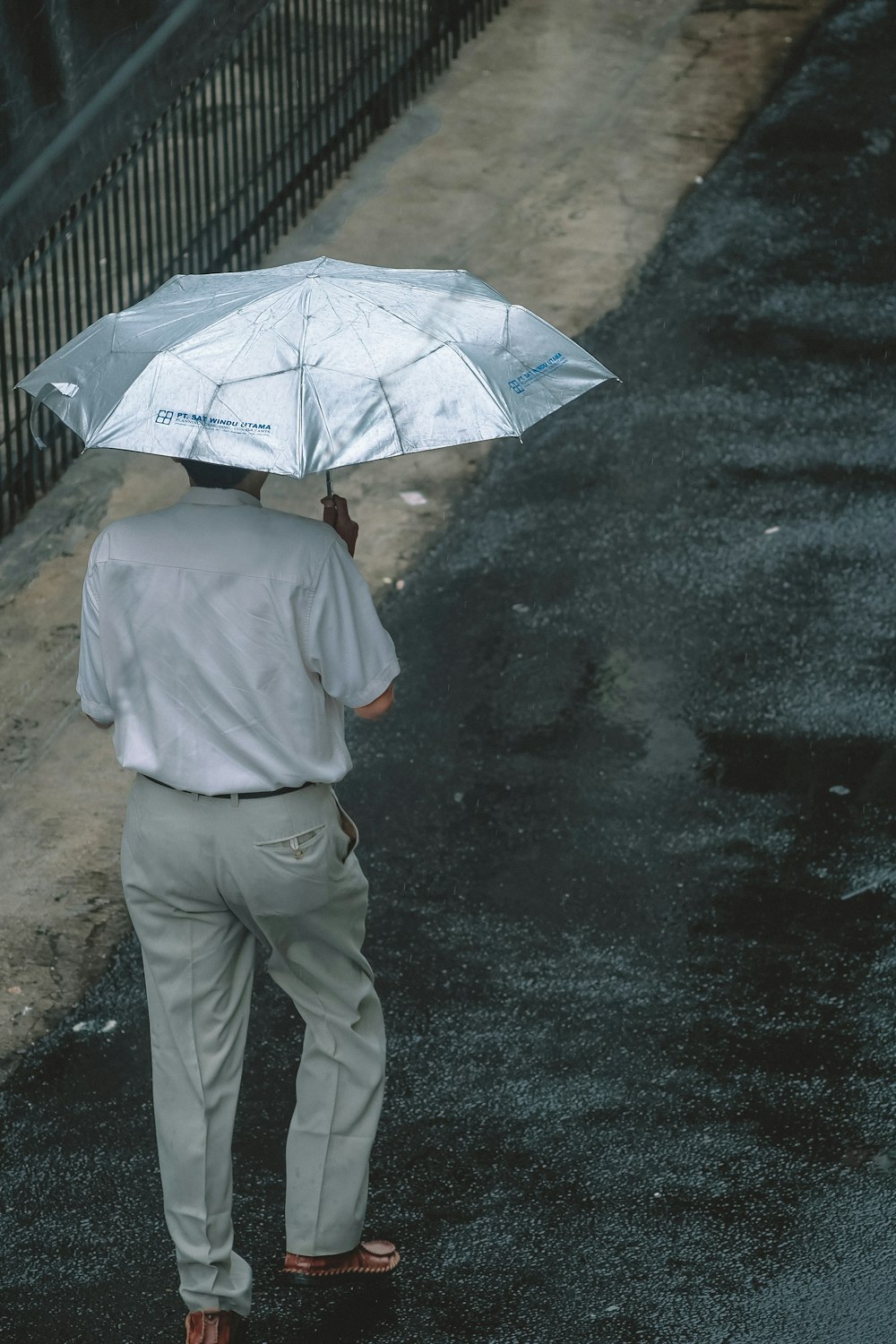 man holding umbrella