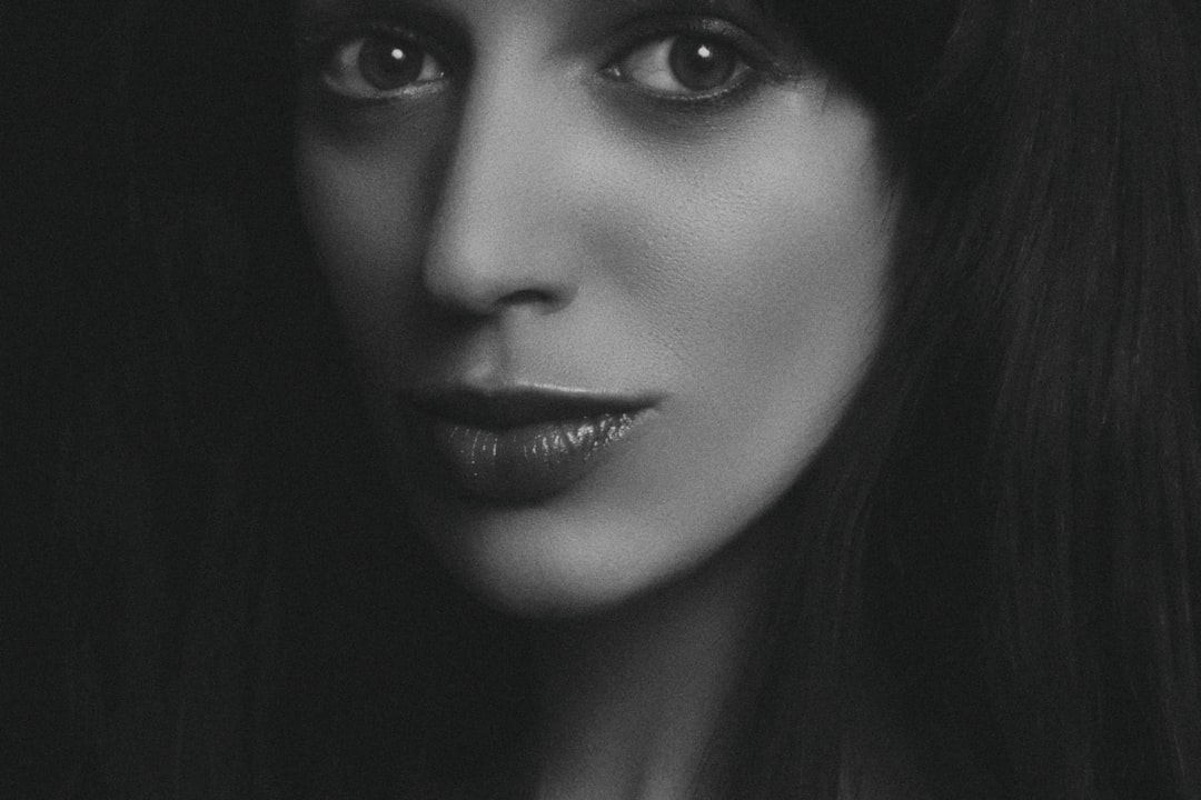grayscale photography of woman