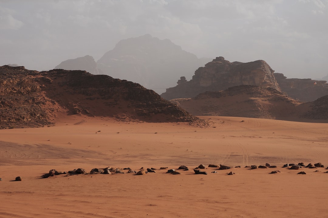 brown desert bounded by hills,