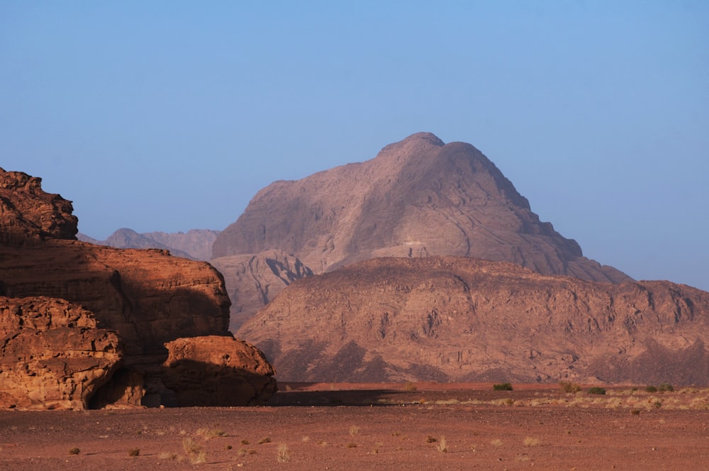 brown rock formation under blue sky during daytime