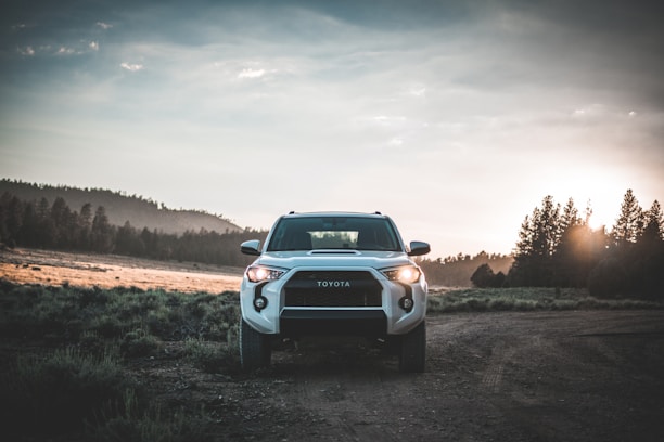 parked white Toyota 4runner on premium tyres sold at the tyrepublic tire shop