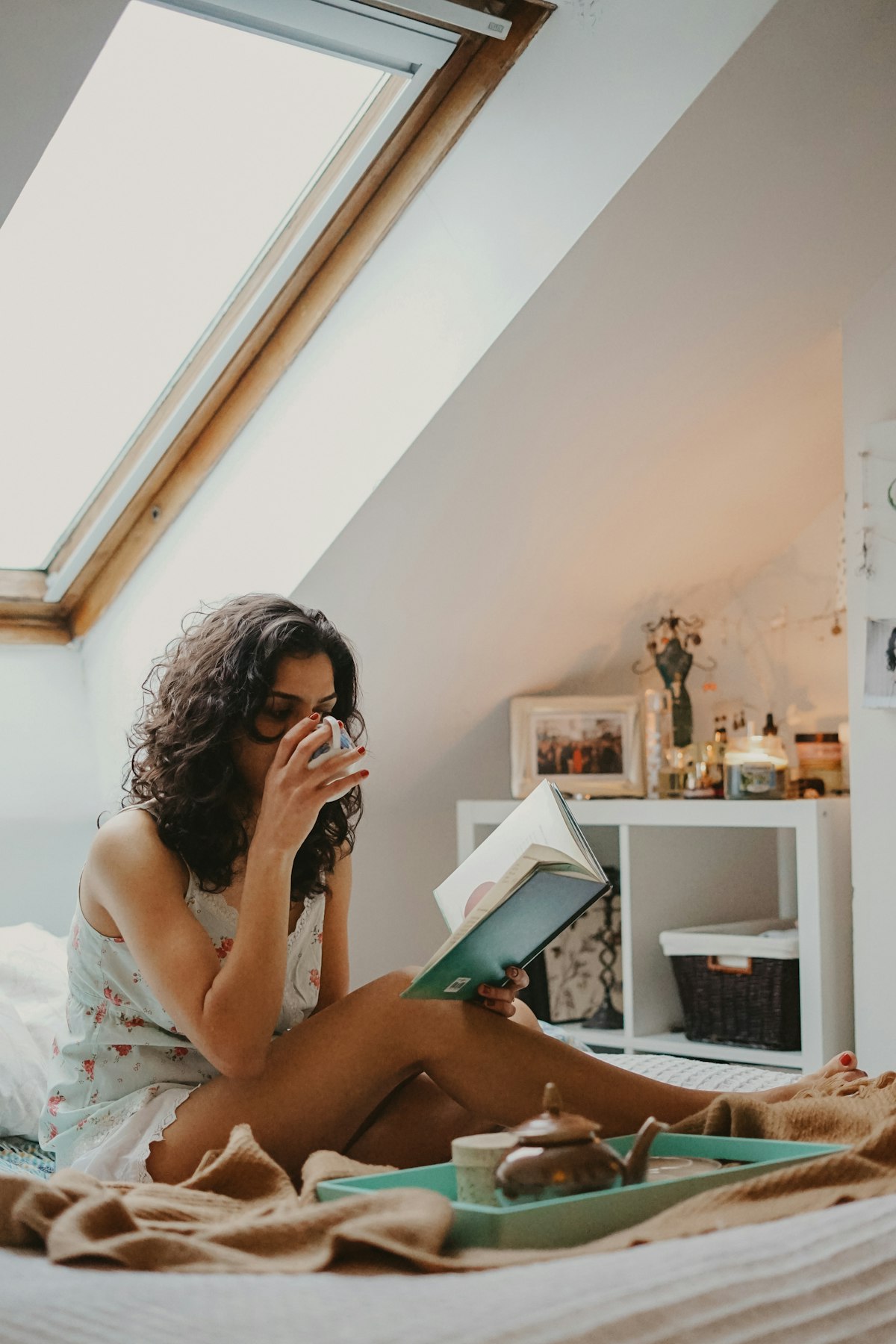 Woman holding a book, reflective reading register