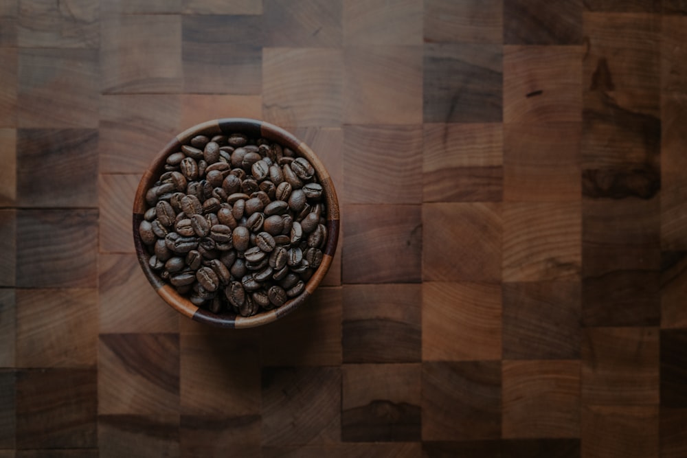 coffee beans on brown bowl