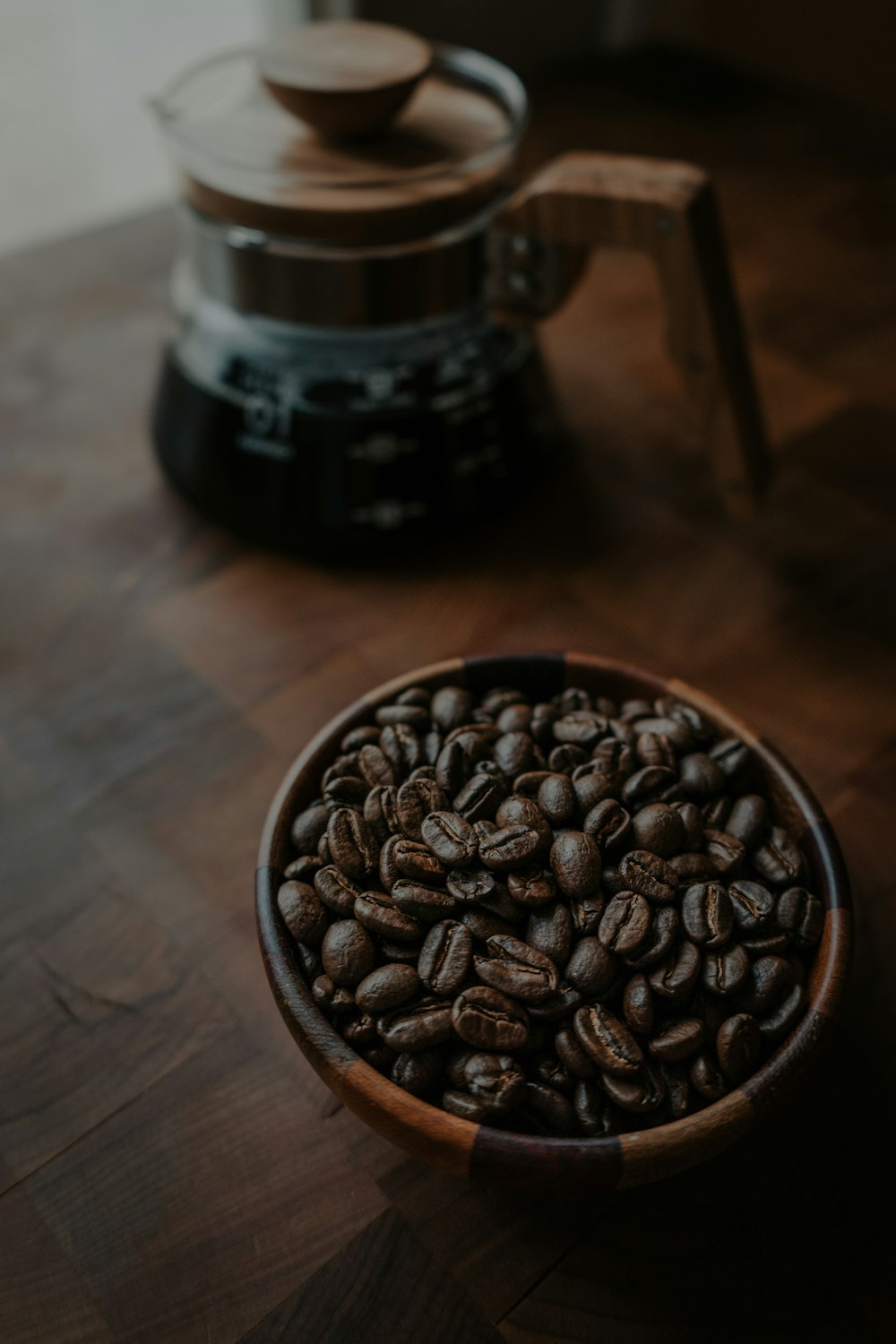 brown coffee beans in bowl