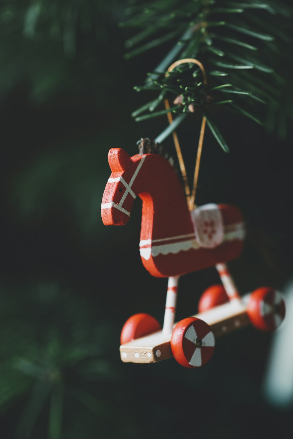 orange and white horse christmas tree ornmaent