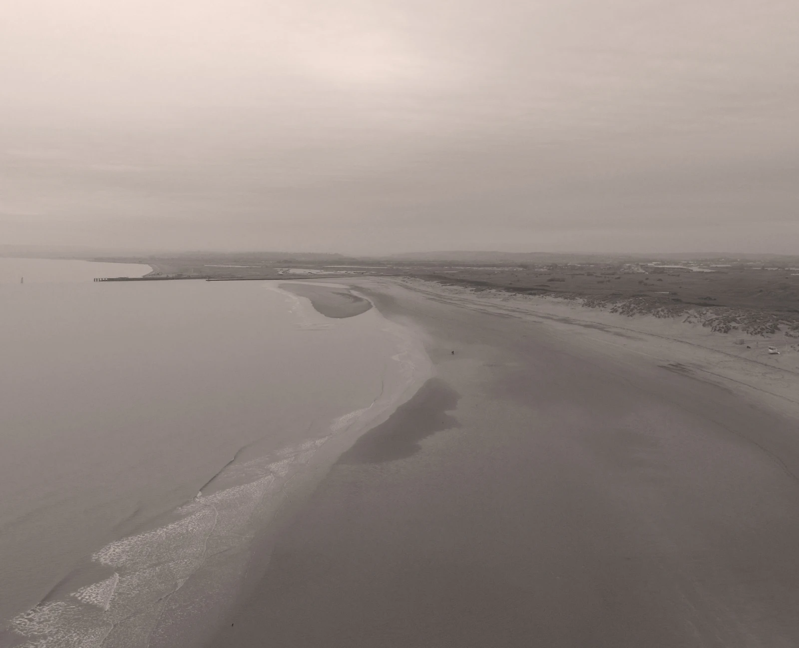 Aerial drone view of Camber Sands beach on the English coast in winter