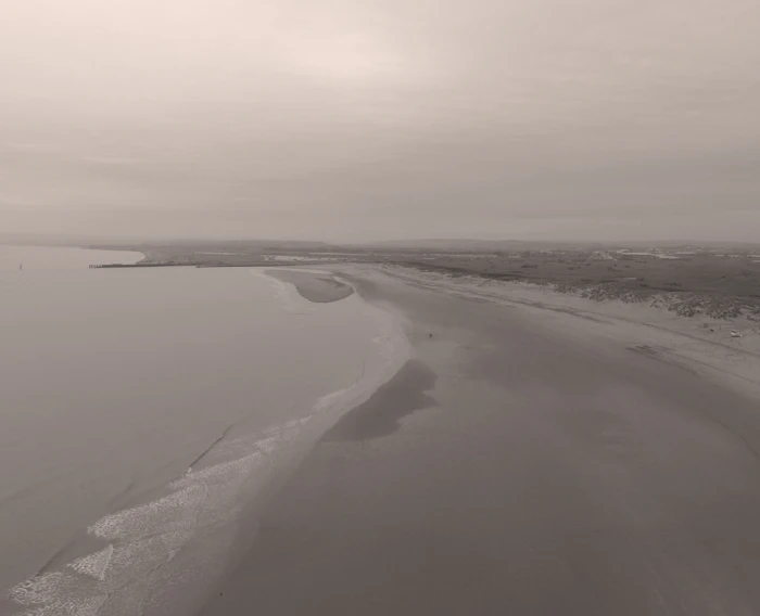 Aerial drone view of Camber Sands beach on the English coast in winter